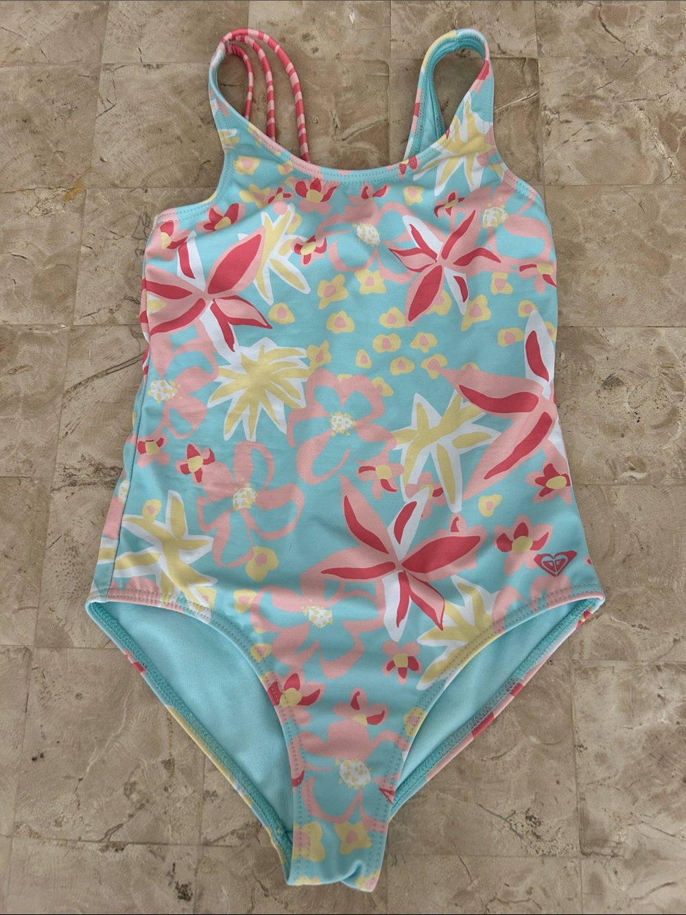 Roxy Girls Holiday Flower‎ One-Piece swimsuit featuring a bright floral print.